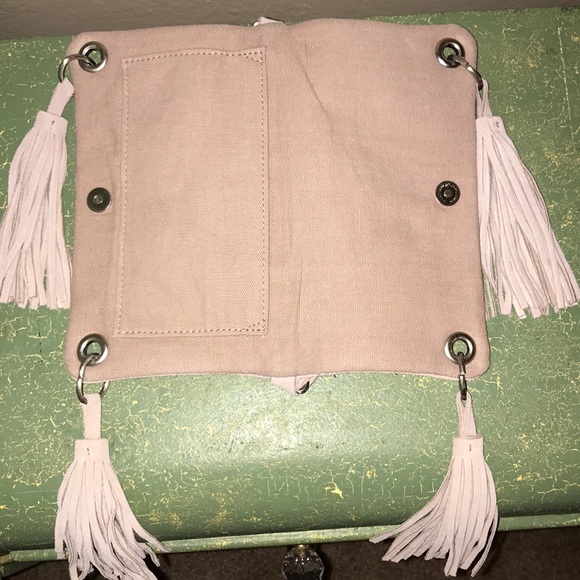 Urban Outfitters Handbags - Urban Outfitters dusty rose quadruple fringe bag